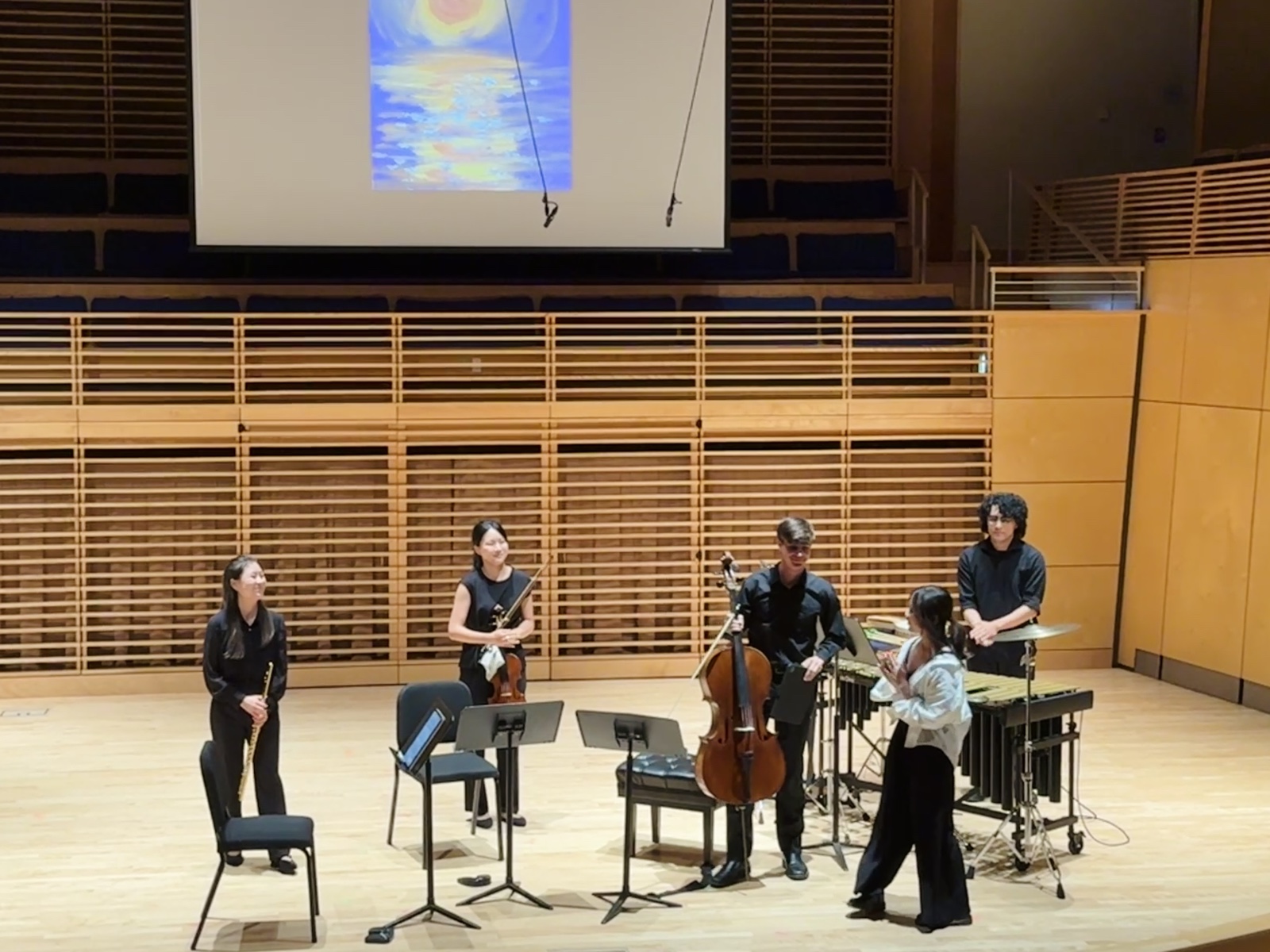 Pierrot-style chamber ensemble with marimba and a projected painting